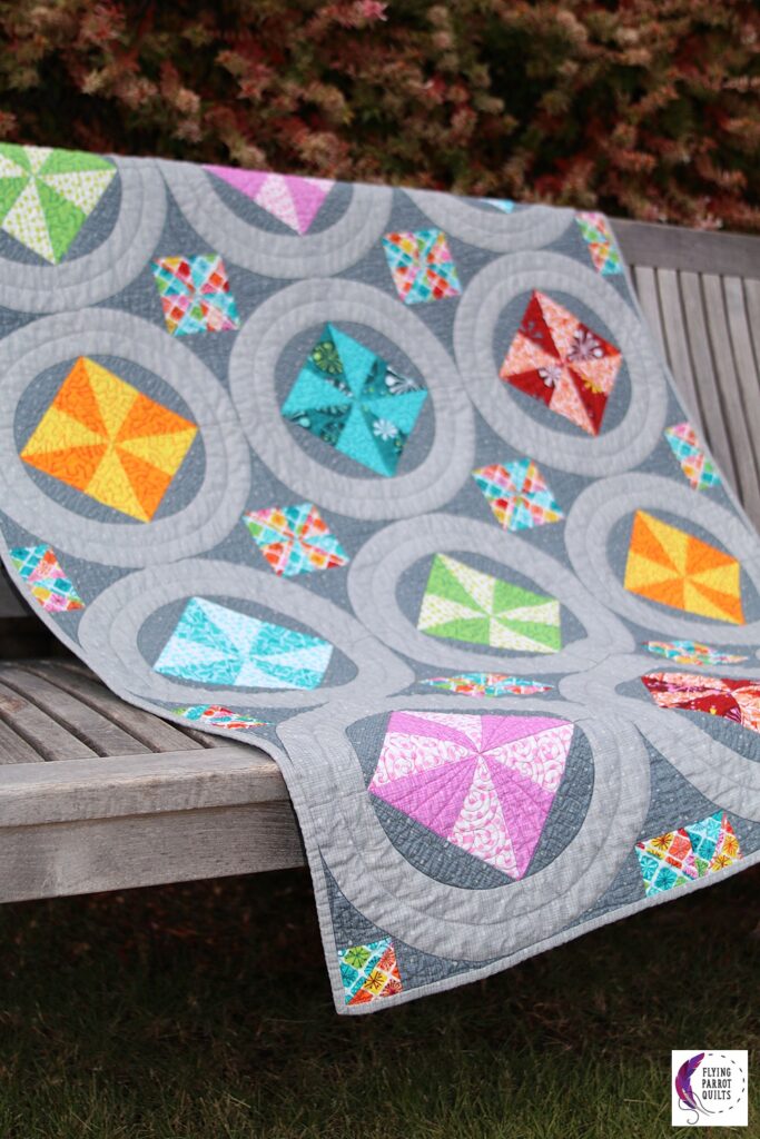 Pinwheel Rings quilt pattern by Sylvia Schaefer/Flying Parrot Quilts | www.flyingparrotquilts.com