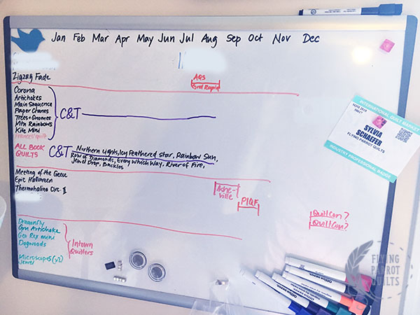 Quilt tracking whiteboard by Sylvia Schaefer/Flying Parrot Quilts | www.flyingparrotquilts.com