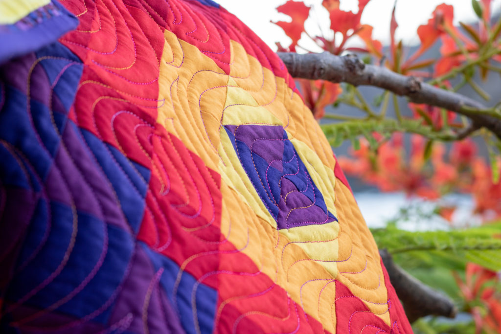 Fiery Sunset by Sylvia Schaefer for the 2020 Quilter's Planner | www.flyingparrotquilts.com