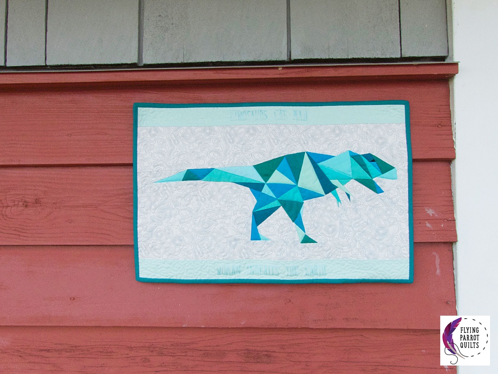 Geo Rex dinosaur mini quilt by Sylvia Schaefer | Flying Parrot Quilts | www.flyingparrotquilts.com