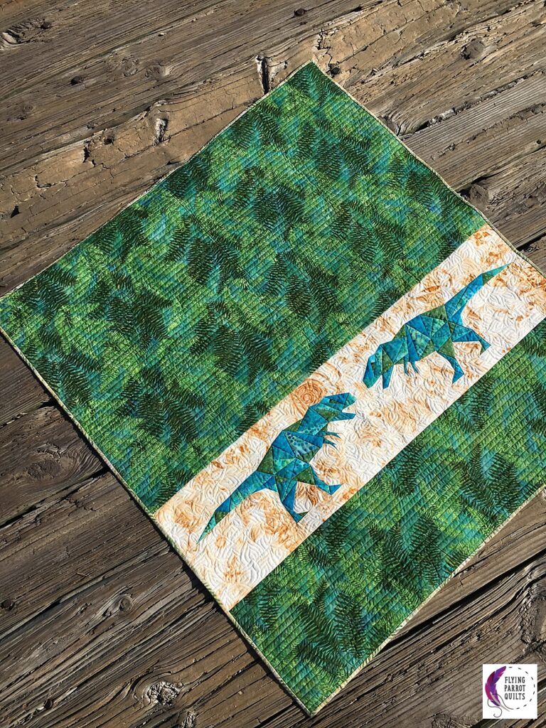 Geo Rex baby quilt by Sylvia Schaefer/Flying Parrot Quilts | www.flyingparrotquilts.com