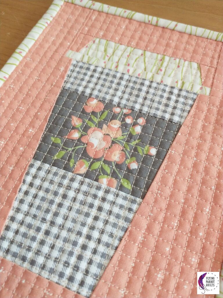 Pink floral coffee cup mug rug by Sylvia Schaefer/Flying Parrot Quilts | www.flyingparrotquilts.com