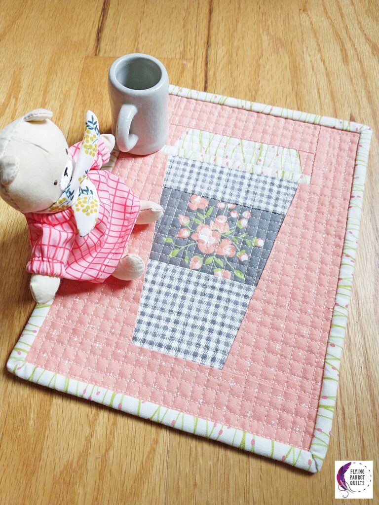 Pink floral coffee cup mug rug by Sylvia Schaefer/Flying Parrot Quilts | www.flyingparrotquilts.com